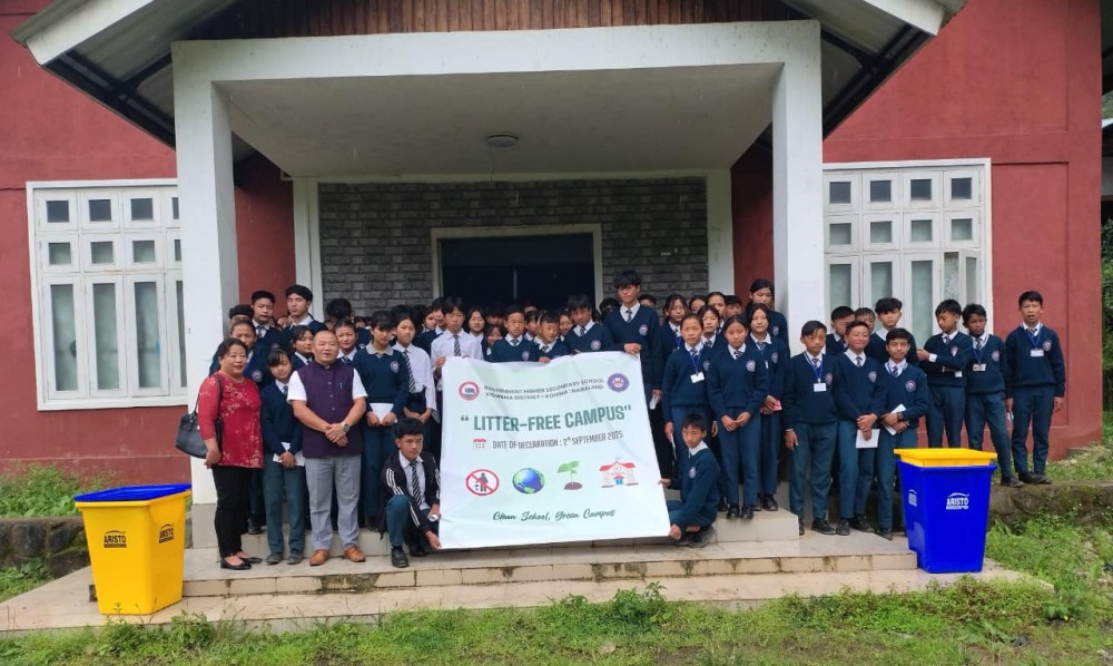 Kelhikha Kenye and others with students during the declaration of GHSS Kigwema as Litter-Free School Campus on September 2.